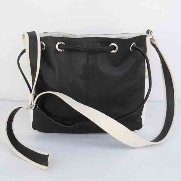 Black color leather purse with black handles,