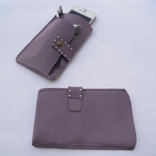 Lavender color leather cover front flap to keep ear plugs.