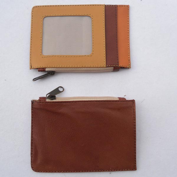 Beige color leather front with multiple color leather & pockets.