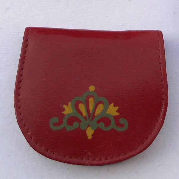 Red color coin pouch with two color print motif on the front.