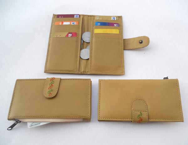 Khaki leather with multiple pockets for credit cards & two large side pockets