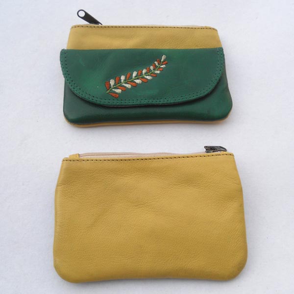 Pale yellow leather with green leather front having a beautiful embroidery.