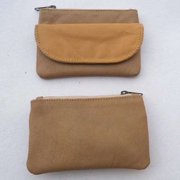 Khaki leather with beige leather flap on the front.