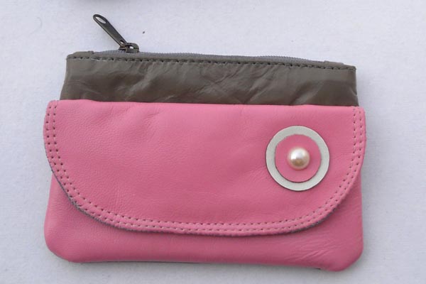 Grey leather with pink flap & front two color collage design with pearls center.