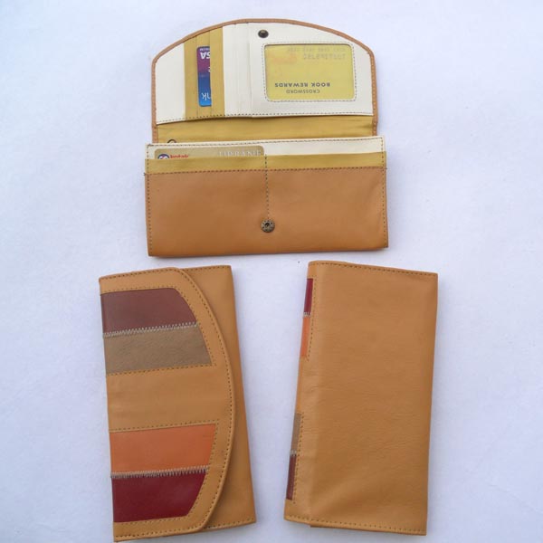 Beige color leather with multiple pockets multiple color leather.