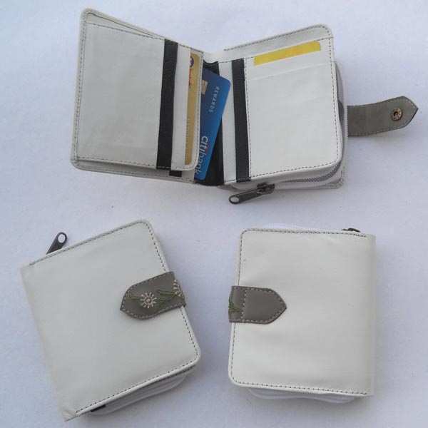 White color leather with multiple pockets outside grey leather finely embroidered stripe wallet