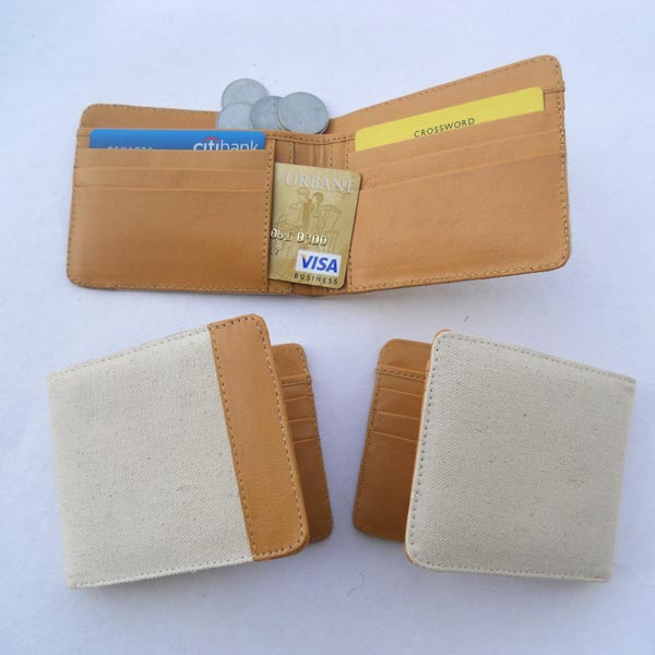 Natural canvas & light brown leather with multiple pockets inside for multiple uses