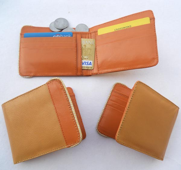 Light brown leather with & light orange leather with multiple uses.