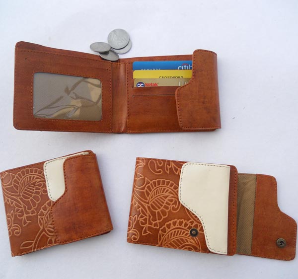 Brown faded carved leather with & white leather with multiple pockets,