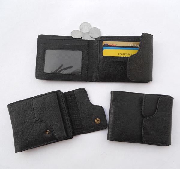 Black leather with multiple pockets inside for multiple uses.