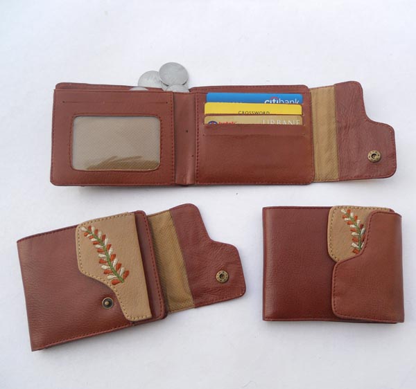 Brown leather with & khaki leather patch beautifully embroidered multiple uses.