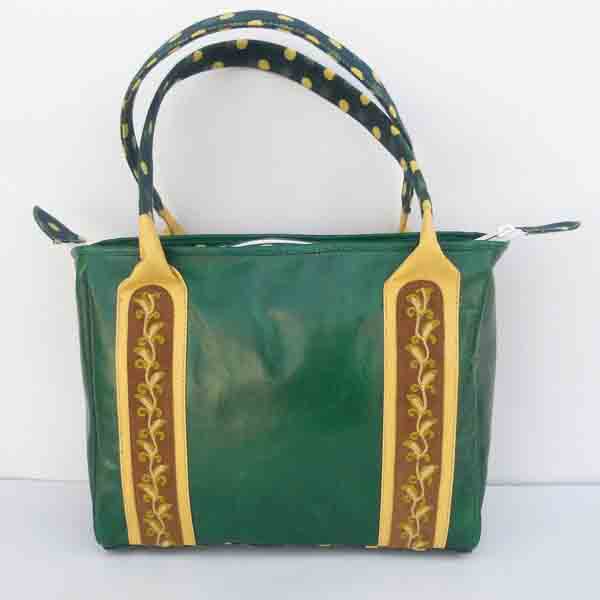 Green color leather purse with embroidered leather suede ,